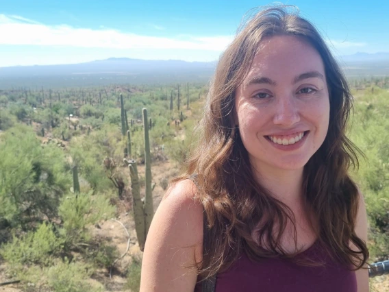 Woman standing in front of Sonoran Desert.