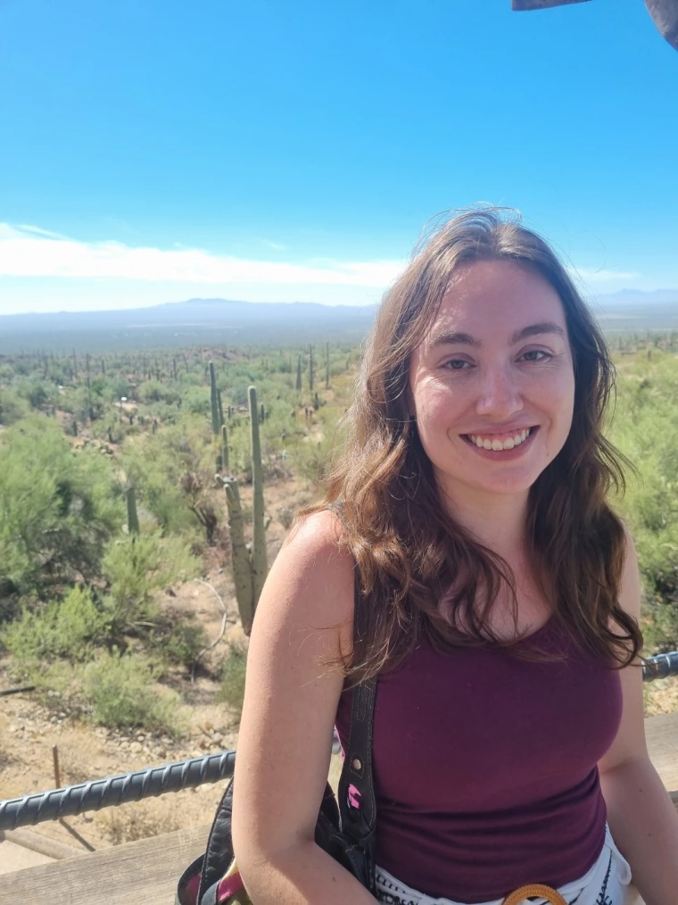 Woman standing in front of Sonoran Desert.